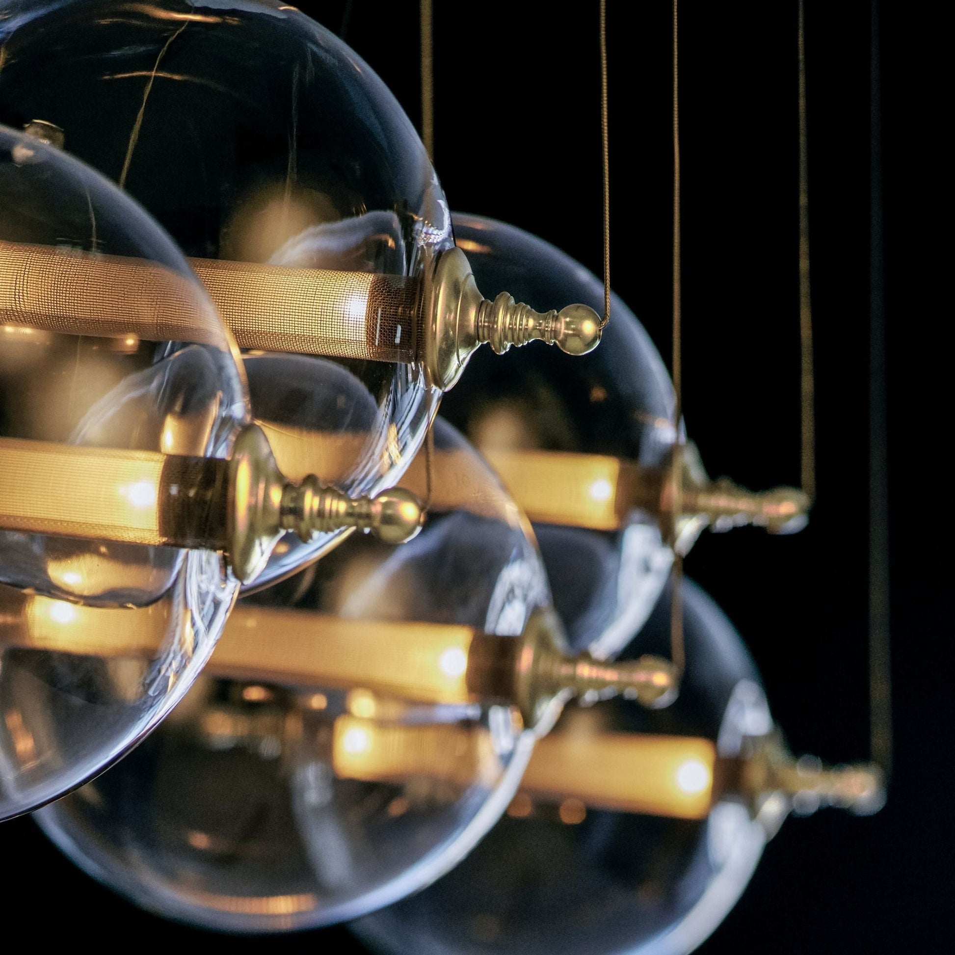 Otto Sphere 5 Light Pendant 10-Light Clear Glass with Stainless Steel Mesh Tube (YT) in Black with Brass Accents