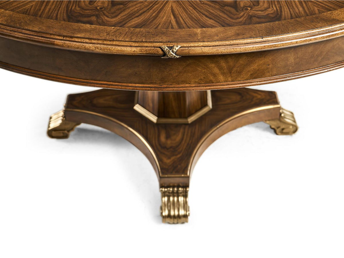 Viceroy Round Wood Brown Santos Dining Table with Brass Accents